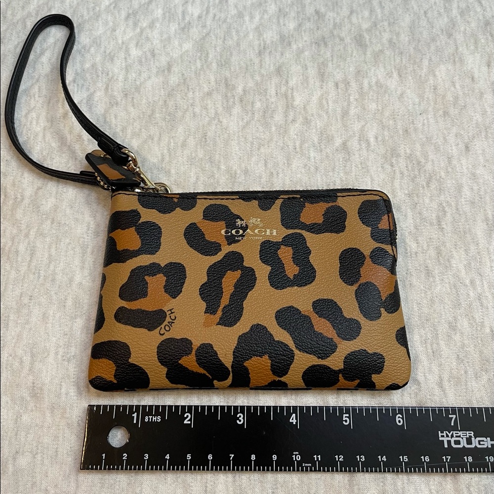 COACH leopard wristlet
